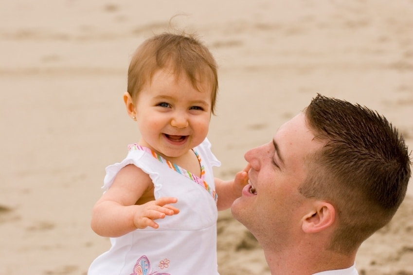 sperm-banking-man-baby-outside-beach | American Pregnancy Association