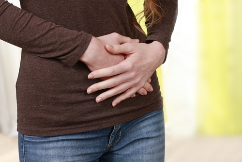 Image of a pregnant woman who has a sharp pain in her stomach